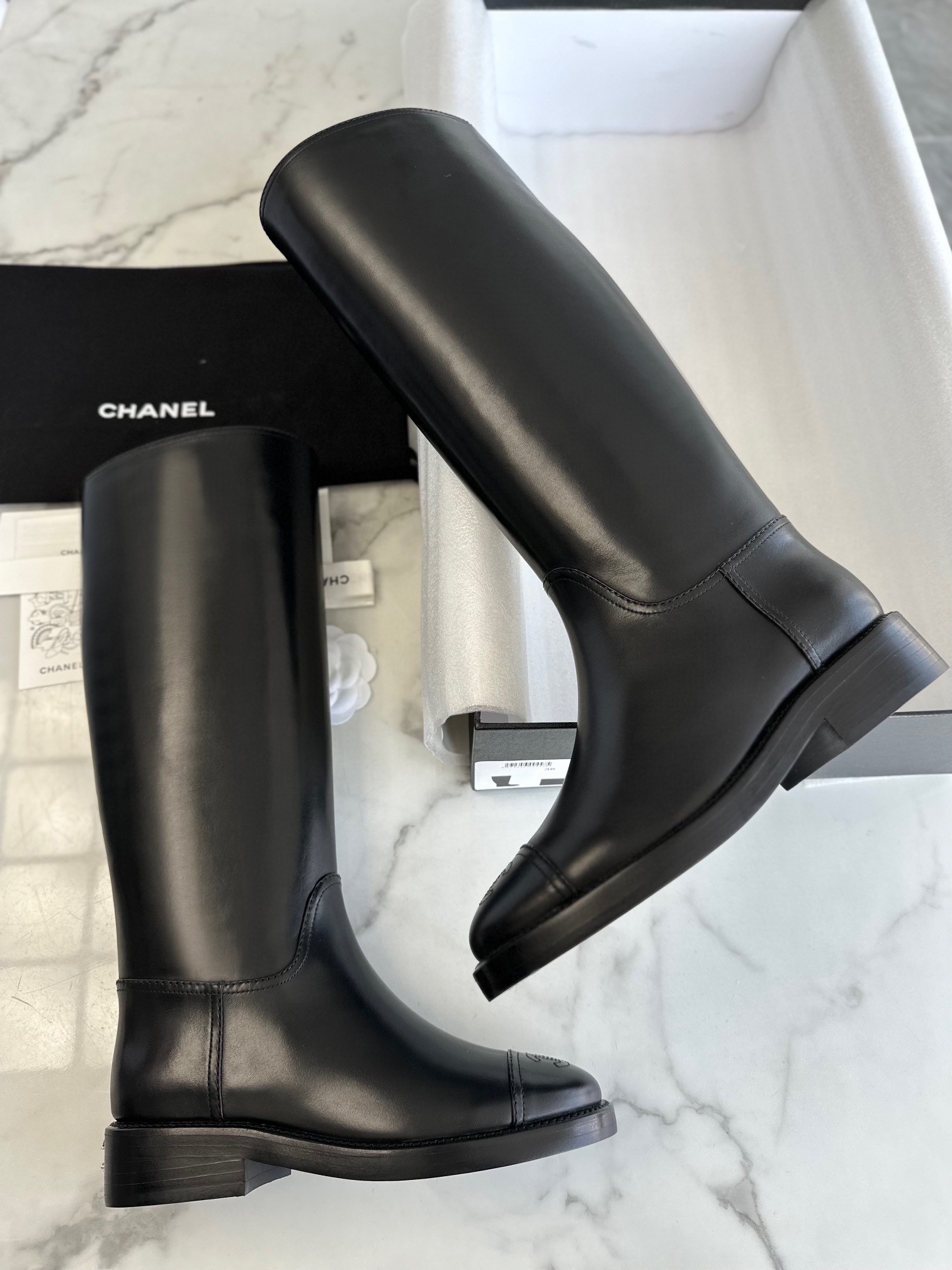 Chanel 23 Classic Knight Boots: Crafted from Premium Calfskin Leather, Luxurious Water-dyed Leather Lining, Stitched with Genuine Leather Outsole, Featuring Large Logo Embossed Leather