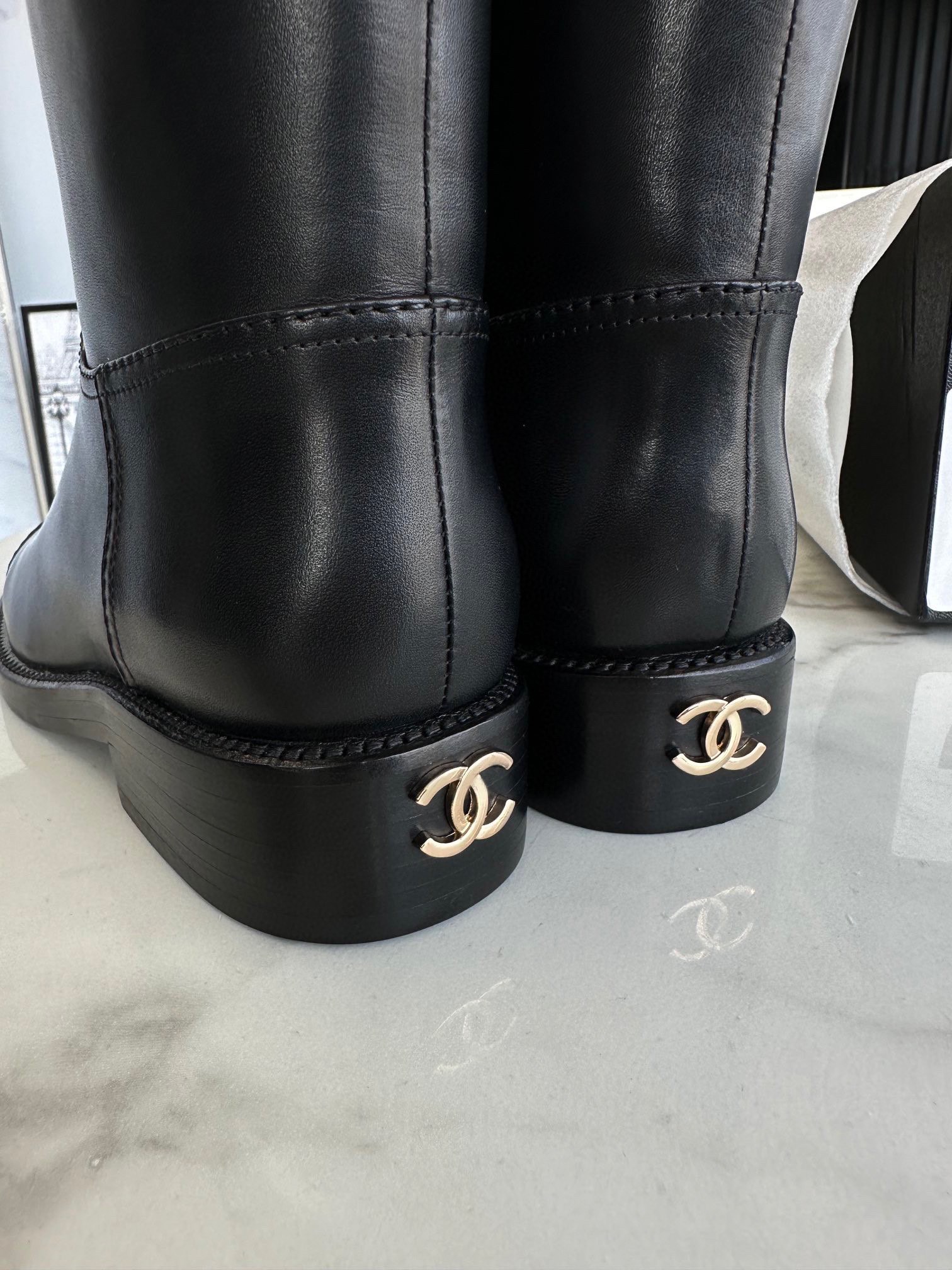 Chanel 23 Classic Knight Boots: Crafted from Premium Calfskin Leather, Luxurious Water-dyed Leather Lining, Stitched with Genuine Leather Outsole, Featuring Large Logo Embossed Leather