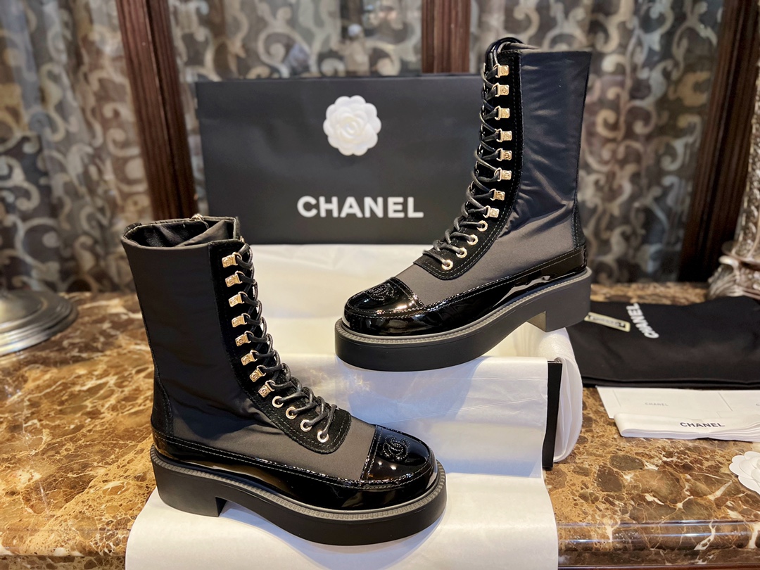 Chanel Martin Boots: The Patent Leather Toe Instantly Adds Refinement to the Overall Look. 