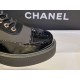 Chanel Martin Boots: The Patent Leather Toe Instantly Adds Refinement to the Overall Look. 