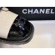 Chanel  Black and White Glossy Crinkled Calfskin Diamond-Patterned Martin Boots: Featuring Classic Sheepskin with Double C Logo Chains, Exquisitely Embroidered Toes, and a Combination of Diamond Patterns and Glossy Crinkled Calfskin