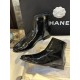 Chanel 23a Crinkled Patent Leather Chelsea Boots: A pair of understated yet exquisitely crafted ankle boots. Featuring sleek black patent leather with subtle gloss, minimalist design with only a brand logo decoration on the vamp. The interior is lined wit