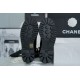 Chanel 23C Black Lace-Up Martin Boots: Crafted with sleek calfskin and patent leather