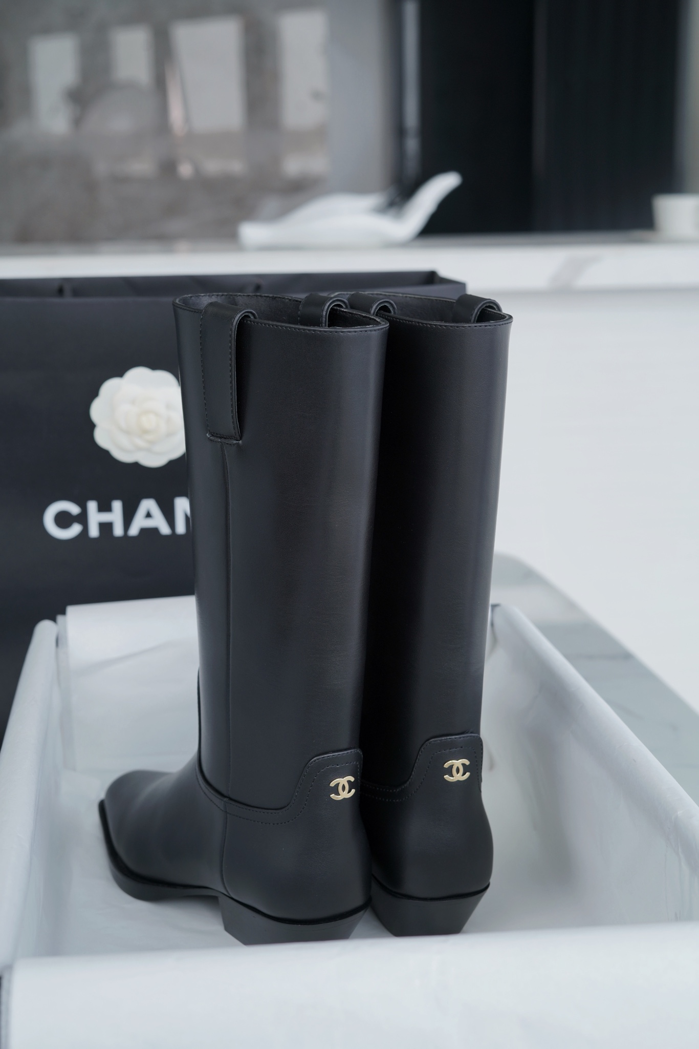 Chanel  23s Square-Toe Knight Boots: Crafted from imported cowhide with fine pores