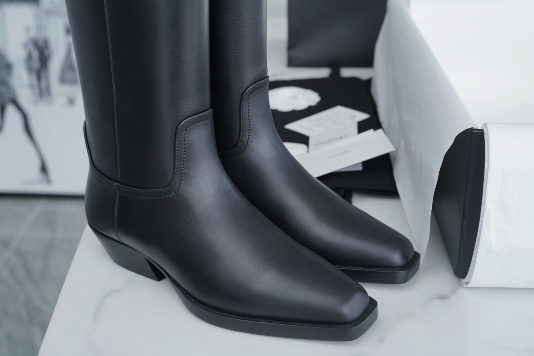 Chanel  23s Square-Toe Knight Boots: Crafted from imported cowhide with fine pores