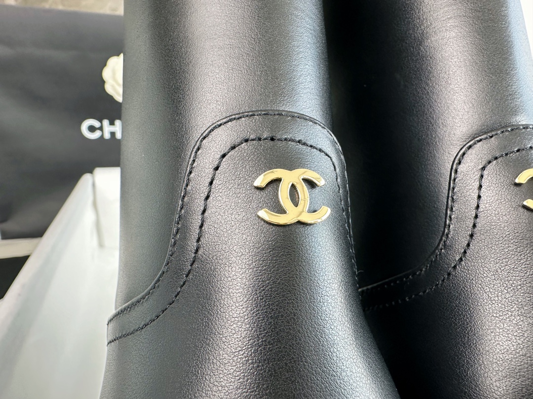 Chanel  23s Square-Toe Knight Boots: Crafted from imported cowhide with fine pores