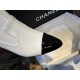 Chanel  23b  Featuring classic black and white contrast with glossy cowhide leather