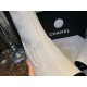 Chanel  23b  Featuring classic black and white contrast with glossy cowhide leather