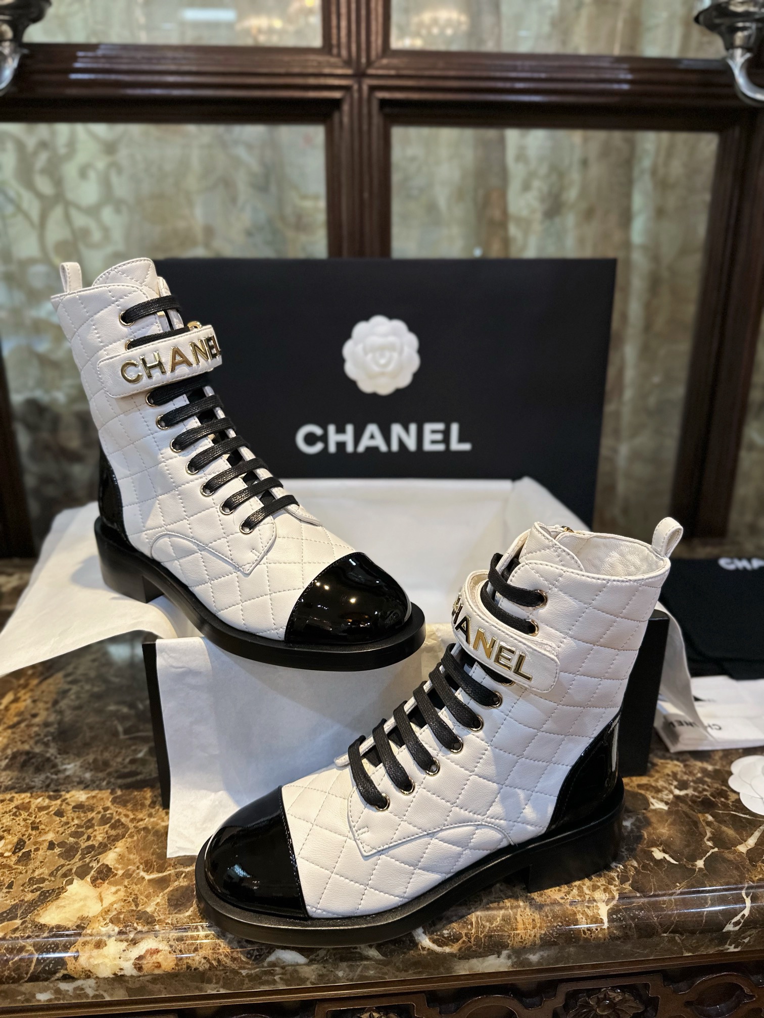 Chanel  23a Black and White Sheepskin Letter Moto Boots