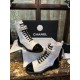 Chanel  23a Black and White Sheepskin Letter Moto Boots