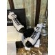 Chanel  23a Black and White Sheepskin Letter Moto Boots