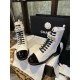 Chanel  23a Black and White Sheepskin Letter Moto Boots