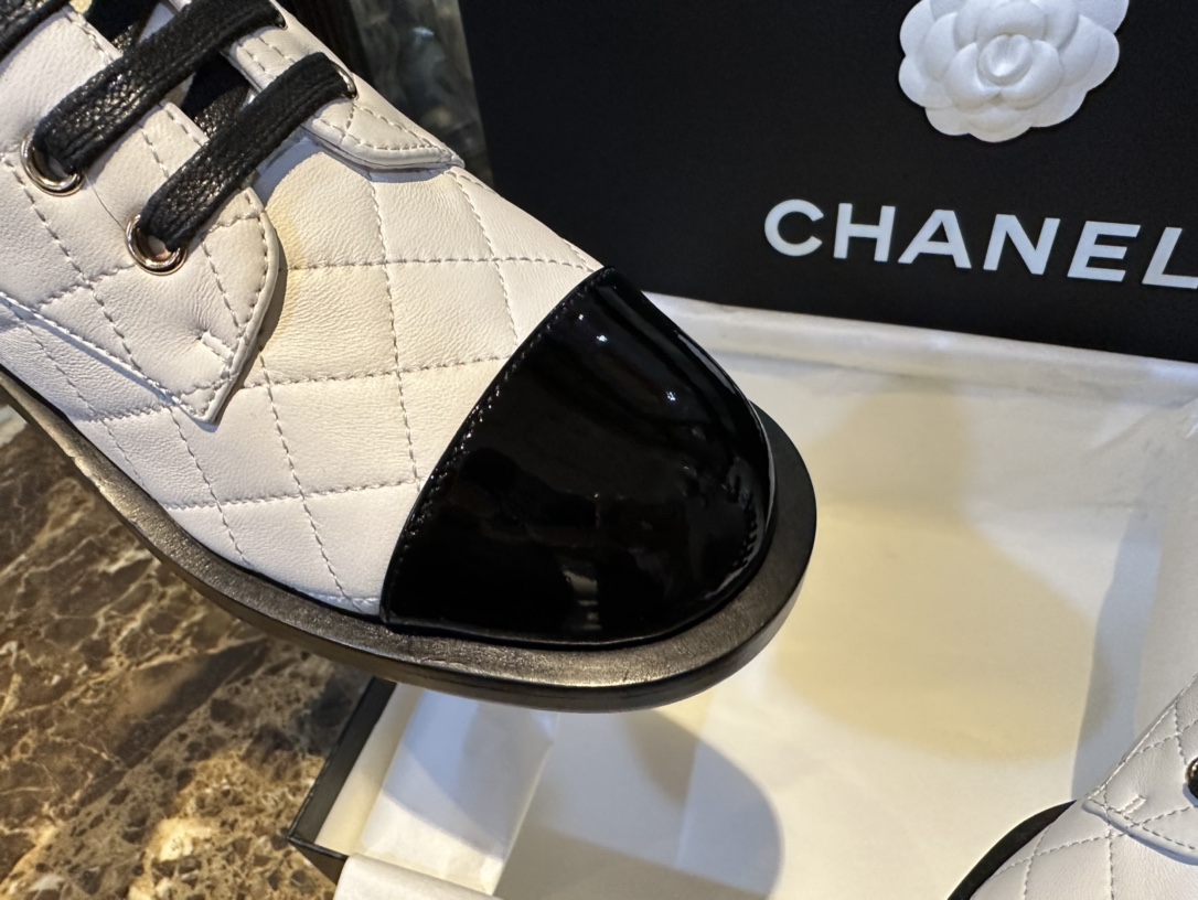 Chanel  23a Black and White Sheepskin Letter Moto Boots