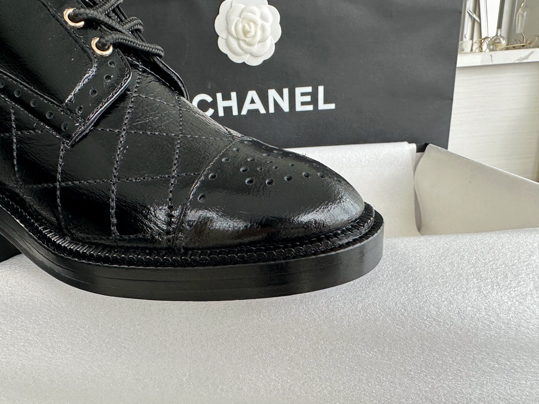 Chanel  23b Wrinkled Patent Leather Lace-Up Boots