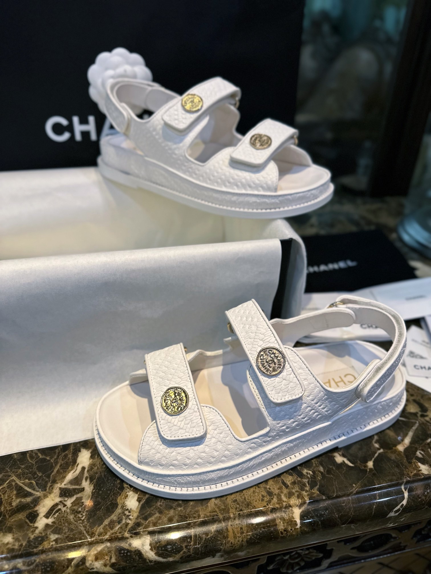 Chanel  White Embossed Gold Coin Beach Sandals - Imported Cowhide with Intricate Pattern, Soft Sheepskin Lining, Vintage Customized Gold Coin Buckle