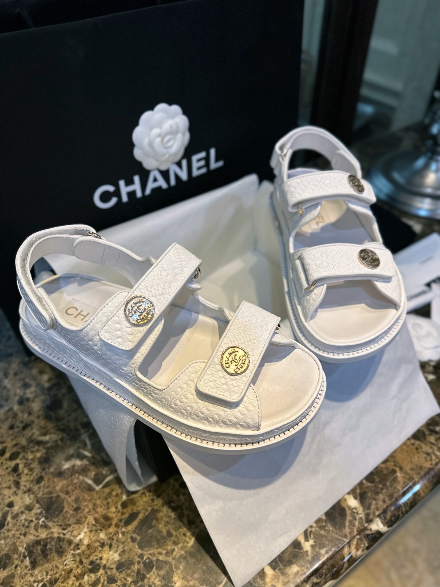 Chanel  White Embossed Gold Coin Beach Sandals - Imported Cowhide with Intricate Pattern, Soft Sheepskin Lining, Vintage Customized Gold Coin Buckle