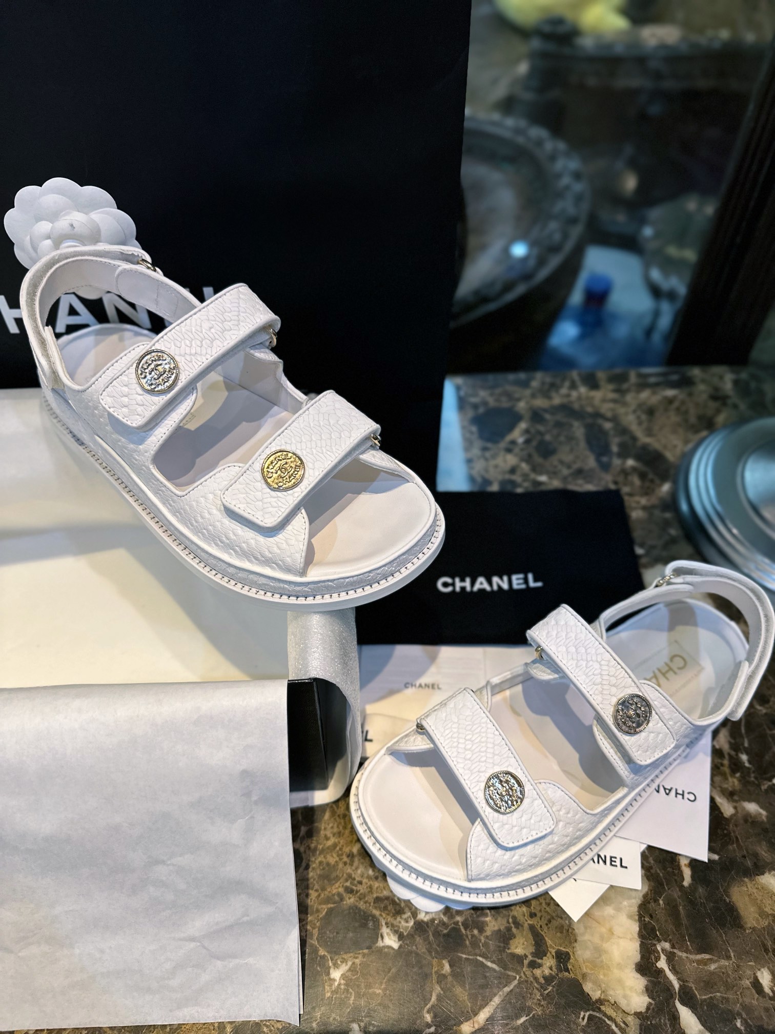 Chanel  White Embossed Gold Coin Beach Sandals - Imported Cowhide with Intricate Pattern, Soft Sheepskin Lining, Vintage Customized Gold Coin Buckle