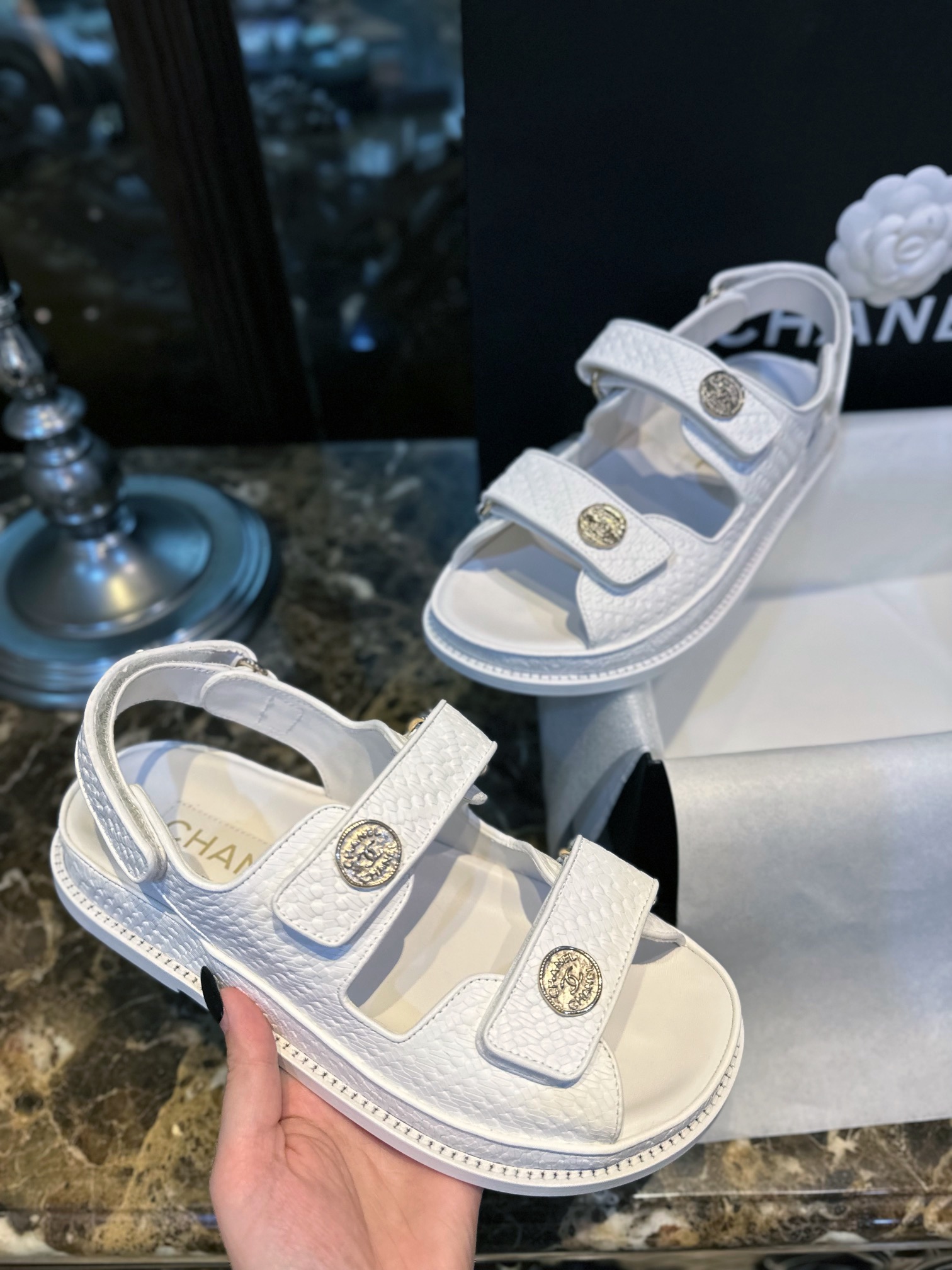 Chanel  White Embossed Gold Coin Beach Sandals - Imported Cowhide with Intricate Pattern, Soft Sheepskin Lining, Vintage Customized Gold Coin Buckle