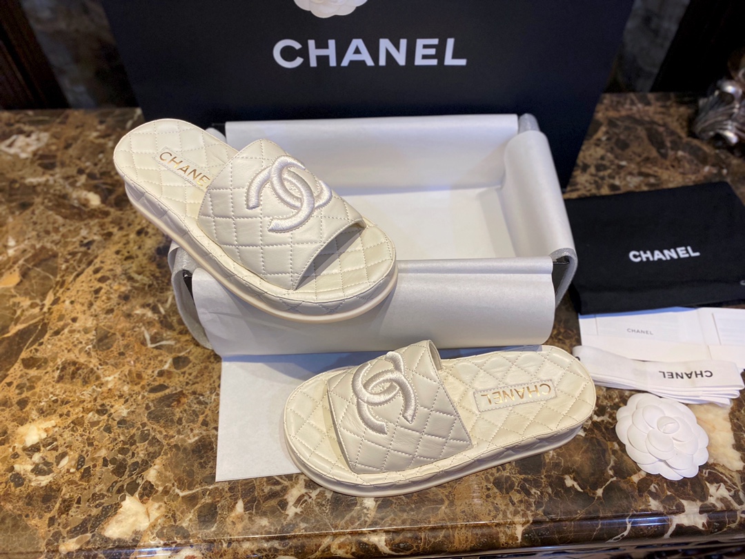 Chanel White Coco Mer Slides: Soft and Creamy On-Foot Sensation 