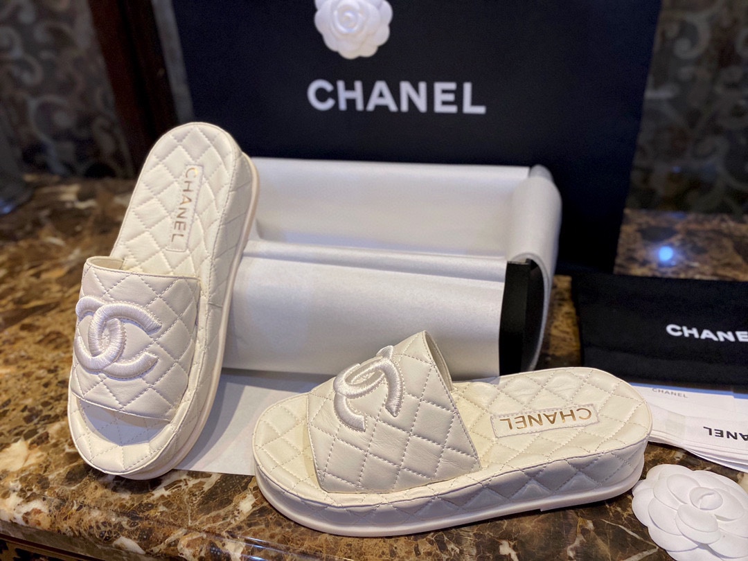 Chanel White Coco Mer Slides: Soft and Creamy On-Foot Sensation 