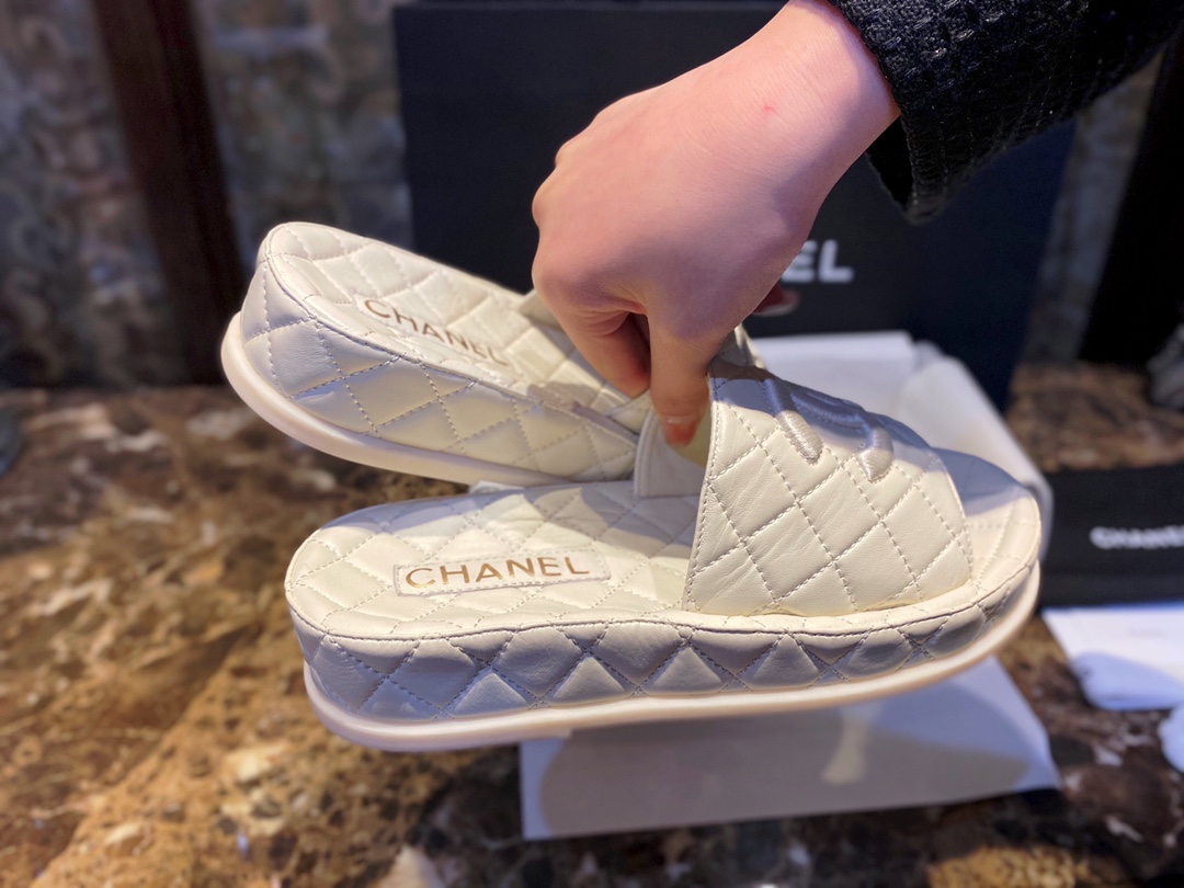 Chanel White Coco Mer Slides: Soft and Creamy On-Foot Sensation 