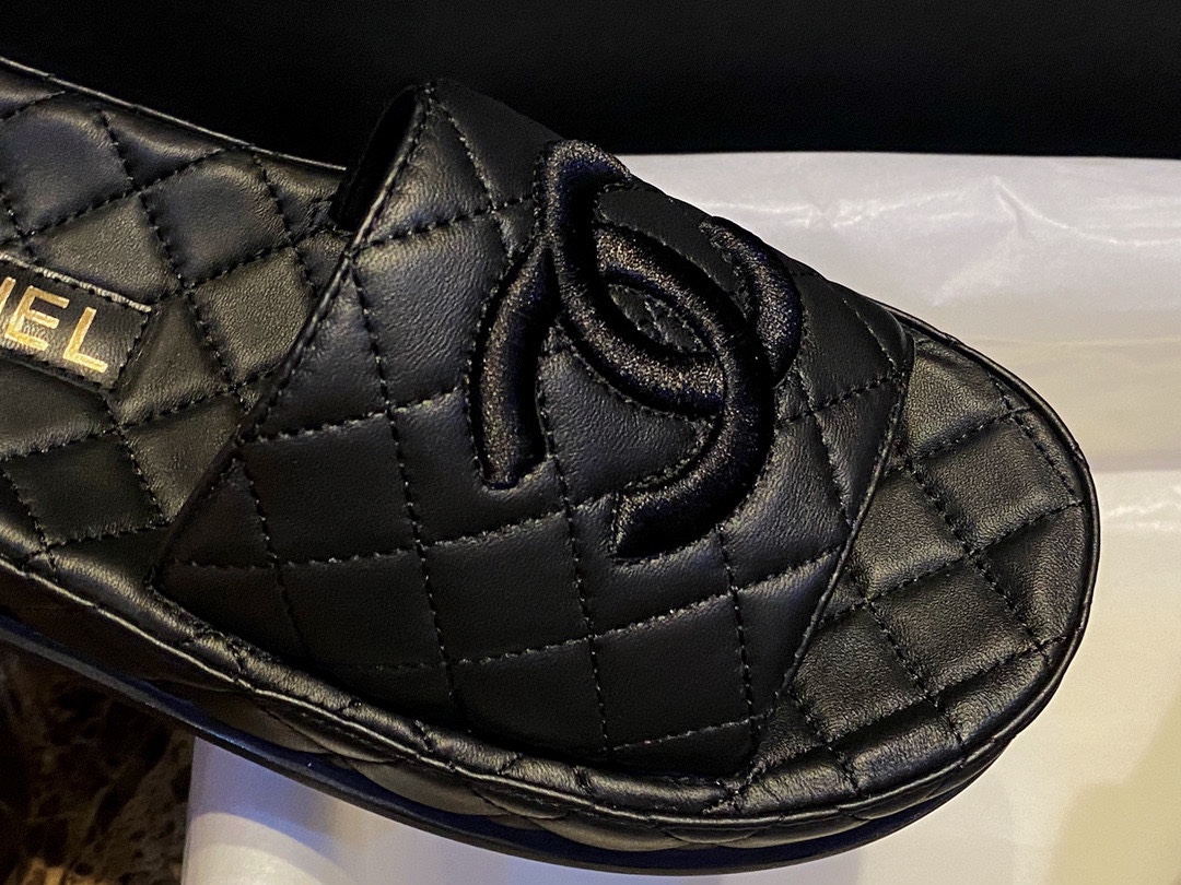 Chanel Classic Black Sheepskin Sandals: Luxurious Comfort with Diamond Pattern Detailing