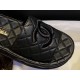 Chanel Classic Black Sheepskin Sandals: Luxurious Comfort with Diamond Pattern Detailing