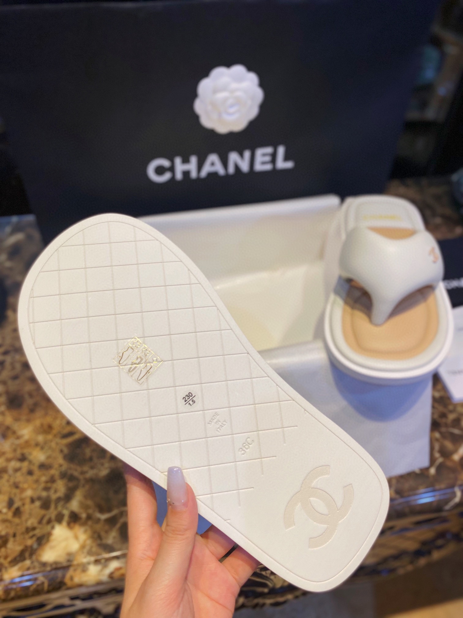 Chanel White Plush Flip Flops: Lightweight, Superior Comfort with Sheepskin-wrapped Footbed and Foam Outsole