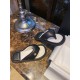 Chanel  Black Plush Flip Flops: Lightweight, Superior Comfort with Sheepskin-wrapped Footbed and Foam Outsole 