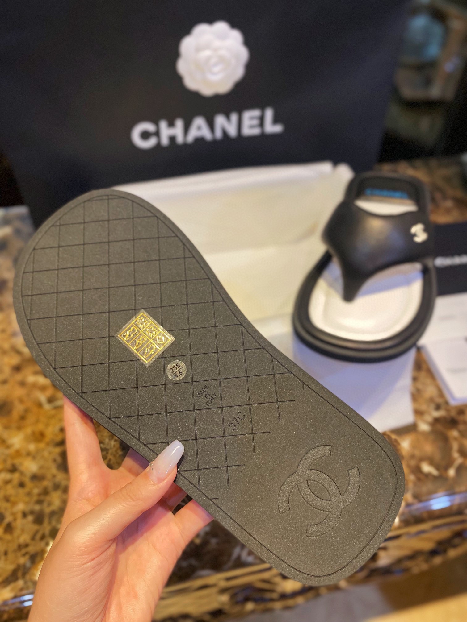 Chanel  Black Plush Flip Flops: Lightweight, Superior Comfort with Sheepskin-wrapped Footbed and Foam Outsole 