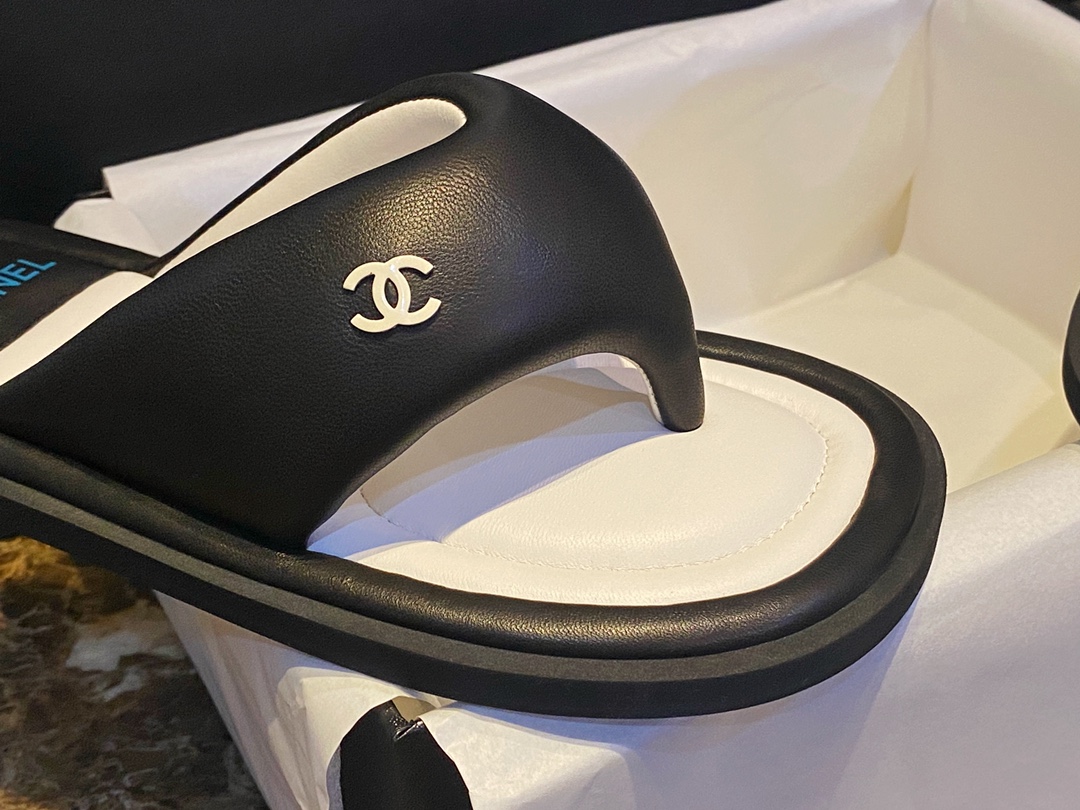 Chanel  Black Plush Flip Flops: Lightweight, Superior Comfort with Sheepskin-wrapped Footbed and Foam Outsole 