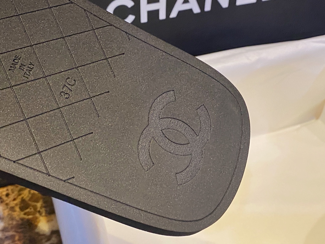 Chanel  Black Plush Flip Flops: Lightweight, Superior Comfort with Sheepskin-wrapped Footbed and Foam Outsole 