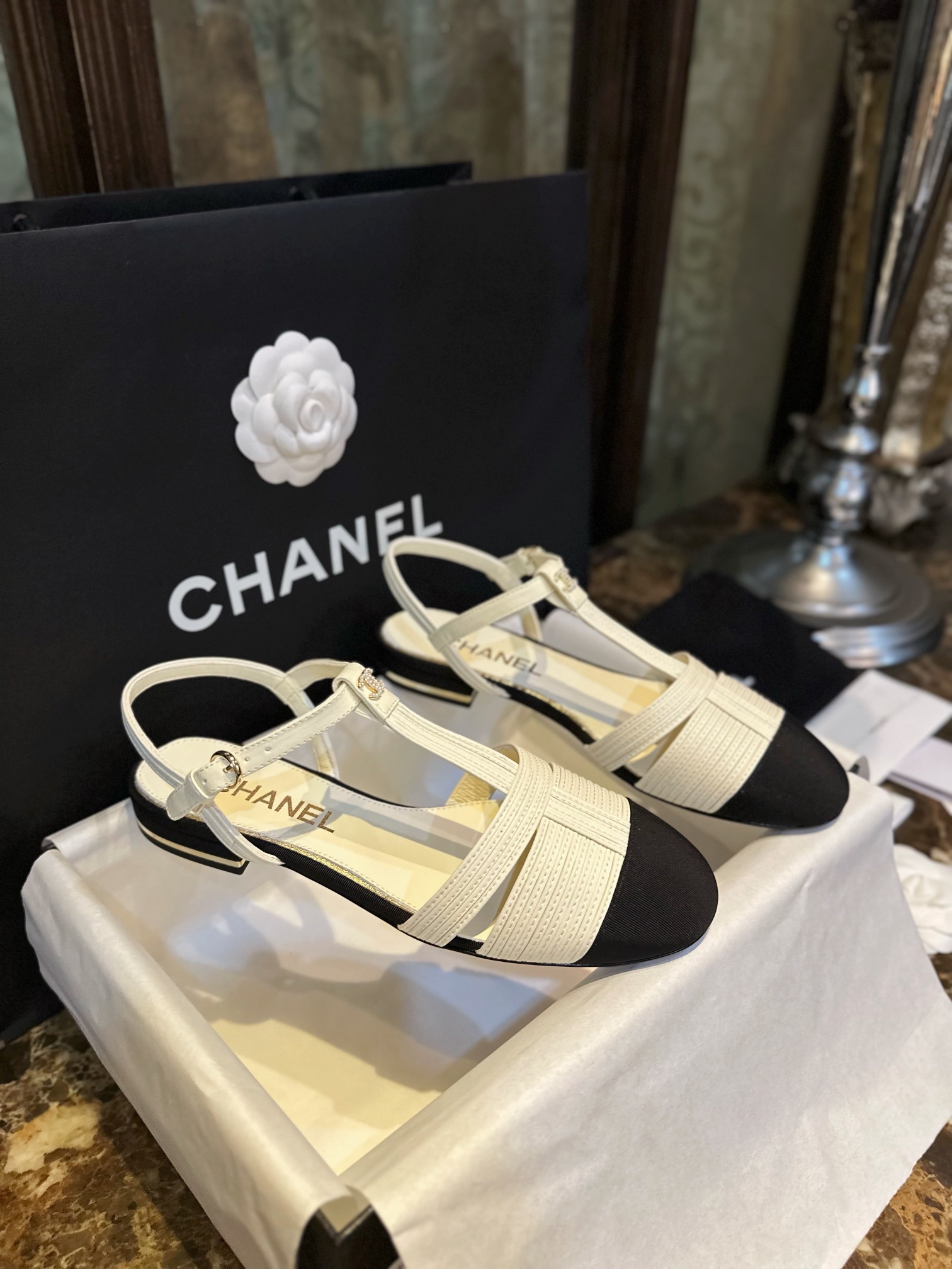 Chanel Black Sheepskin Woven Flat Sandals with Pearl Embellishments