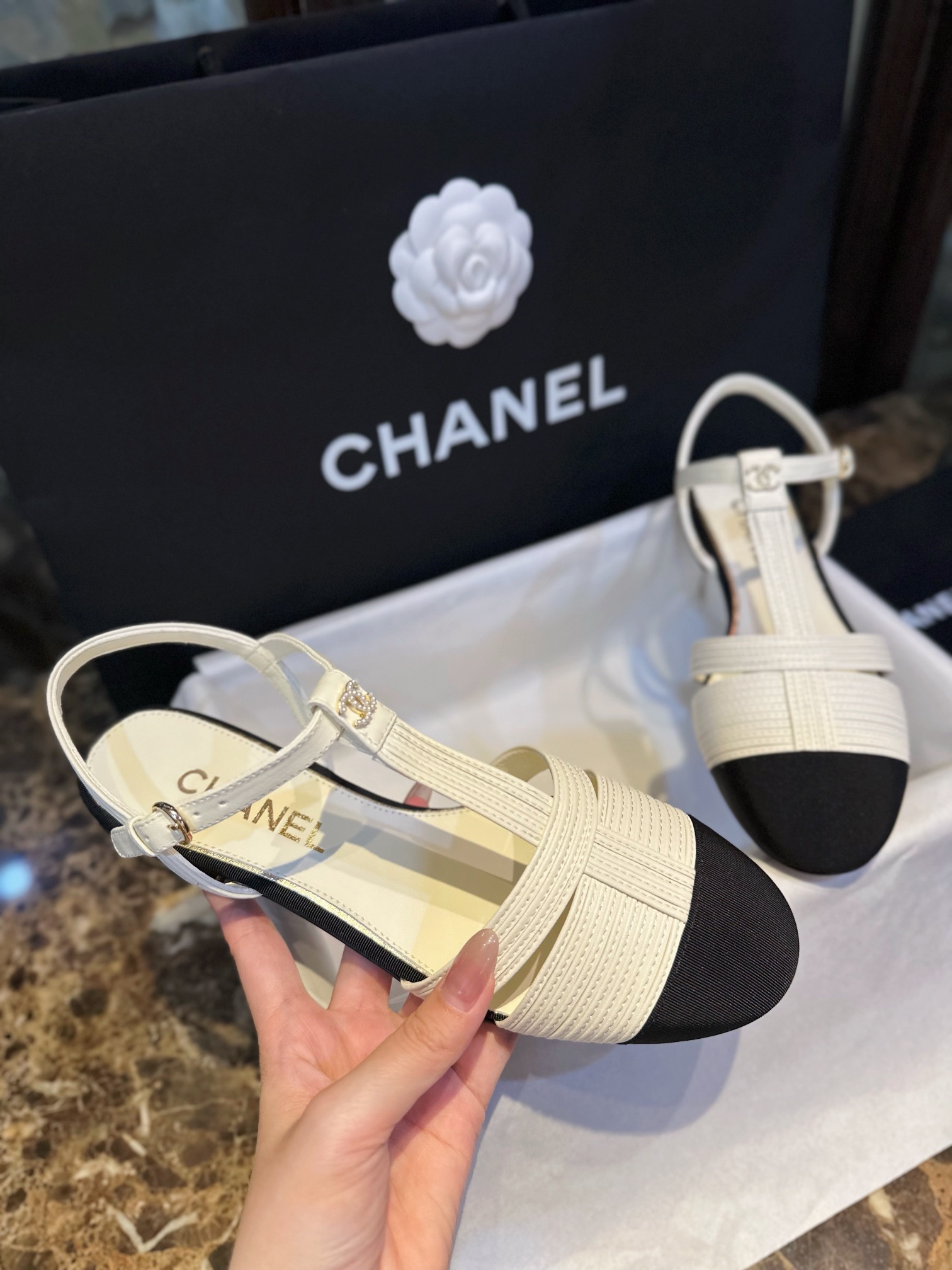 Chanel Black Sheepskin Woven Flat Sandals with Pearl Embellishments