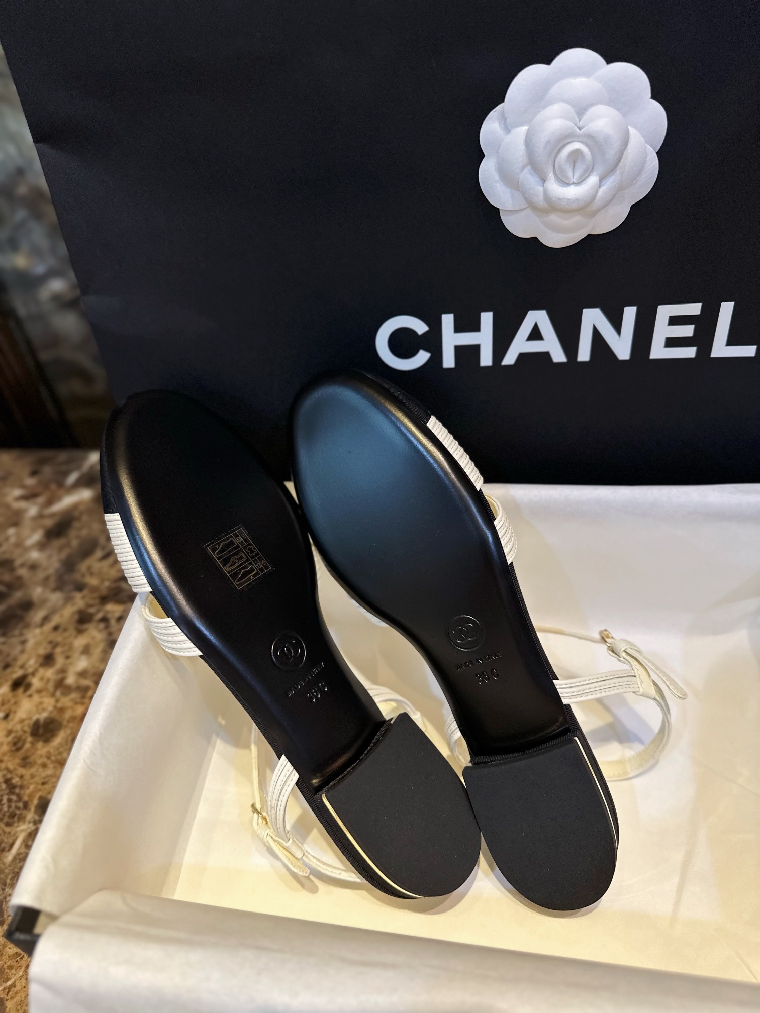 Chanel Black Sheepskin Woven Flat Sandals with Pearl Embellishments