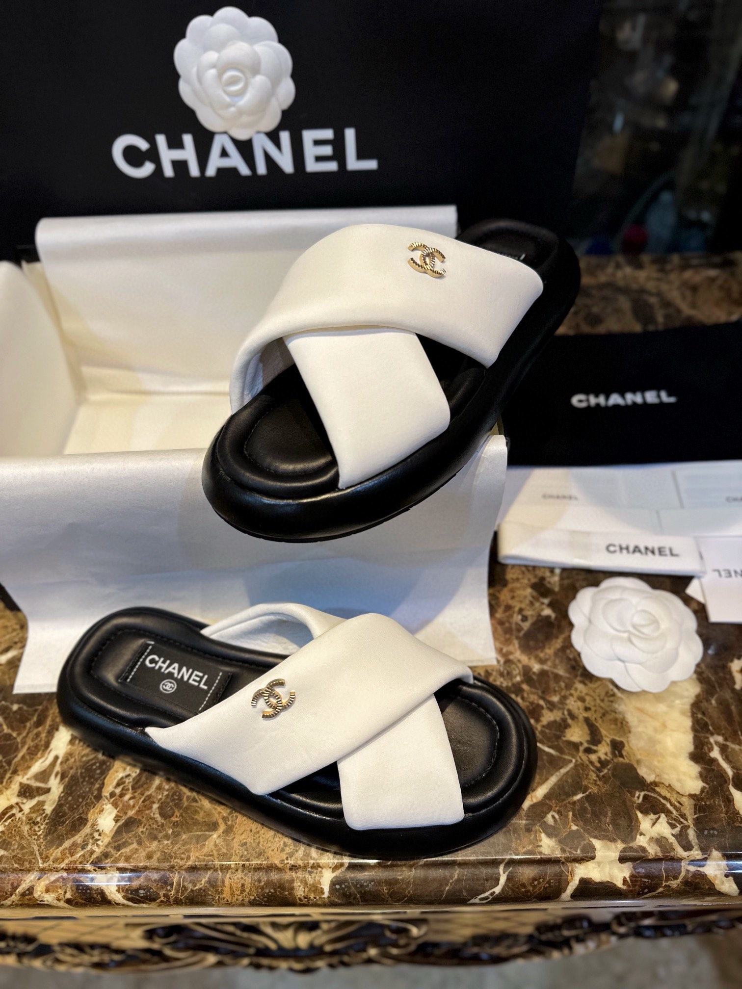 Chanel White Crossed Strap Bread Sandals with Custom Elastic Knit Fabric and Imported Sheepskin Midsole