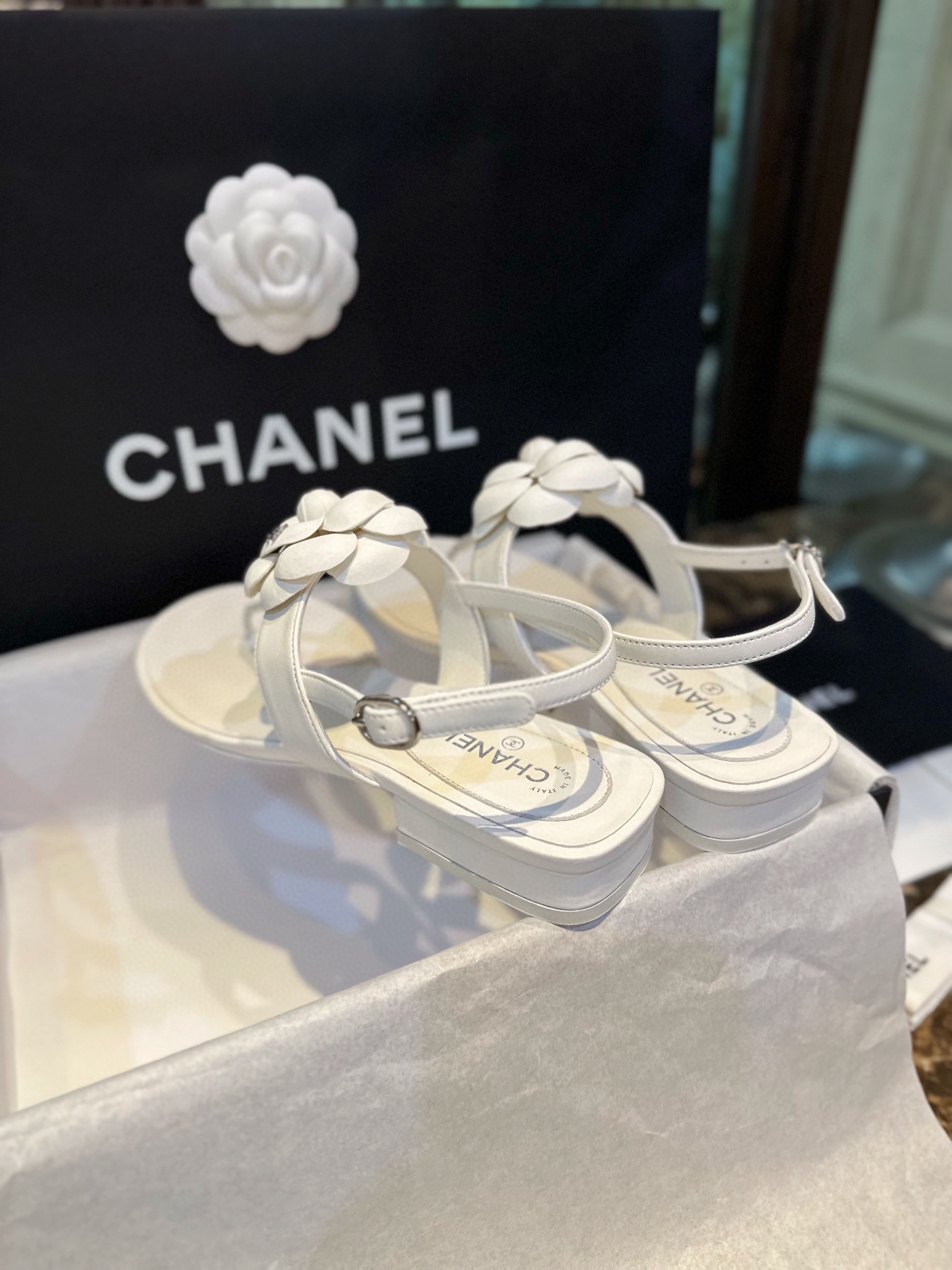 Chanel All White Camellia Sandals: Elegant Toe-Strap Design with Pure Dyed Sheepskin and Leather Sole