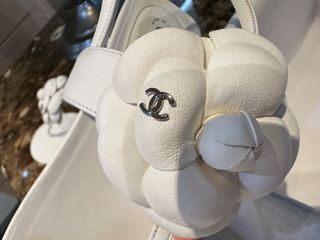 Chanel All White Camellia Sandals: Elegant Toe-Strap Design with Pure Dyed Sheepskin and Leather Sole