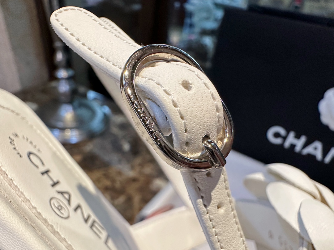 Chanel All White Camellia Sandals: Elegant Toe-Strap Design with Pure Dyed Sheepskin and Leather Sole