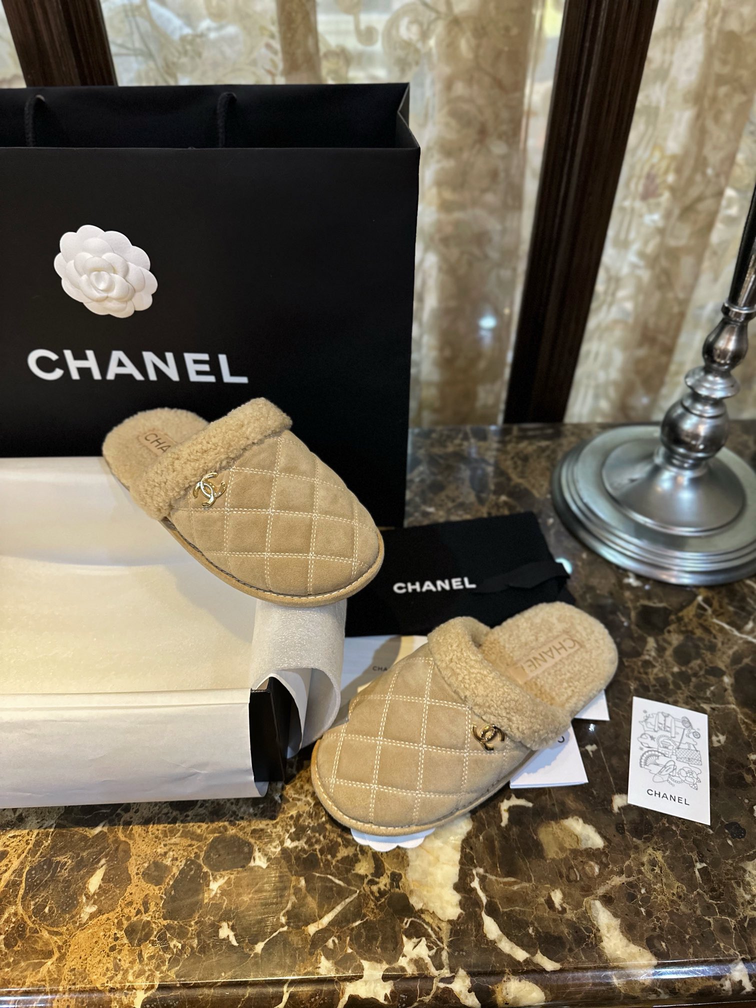 Chanel Shearling Grid Pattern Slide Sandals: Warmth and Style Combined with Luxurious Sheepskin and Cozy Shearling