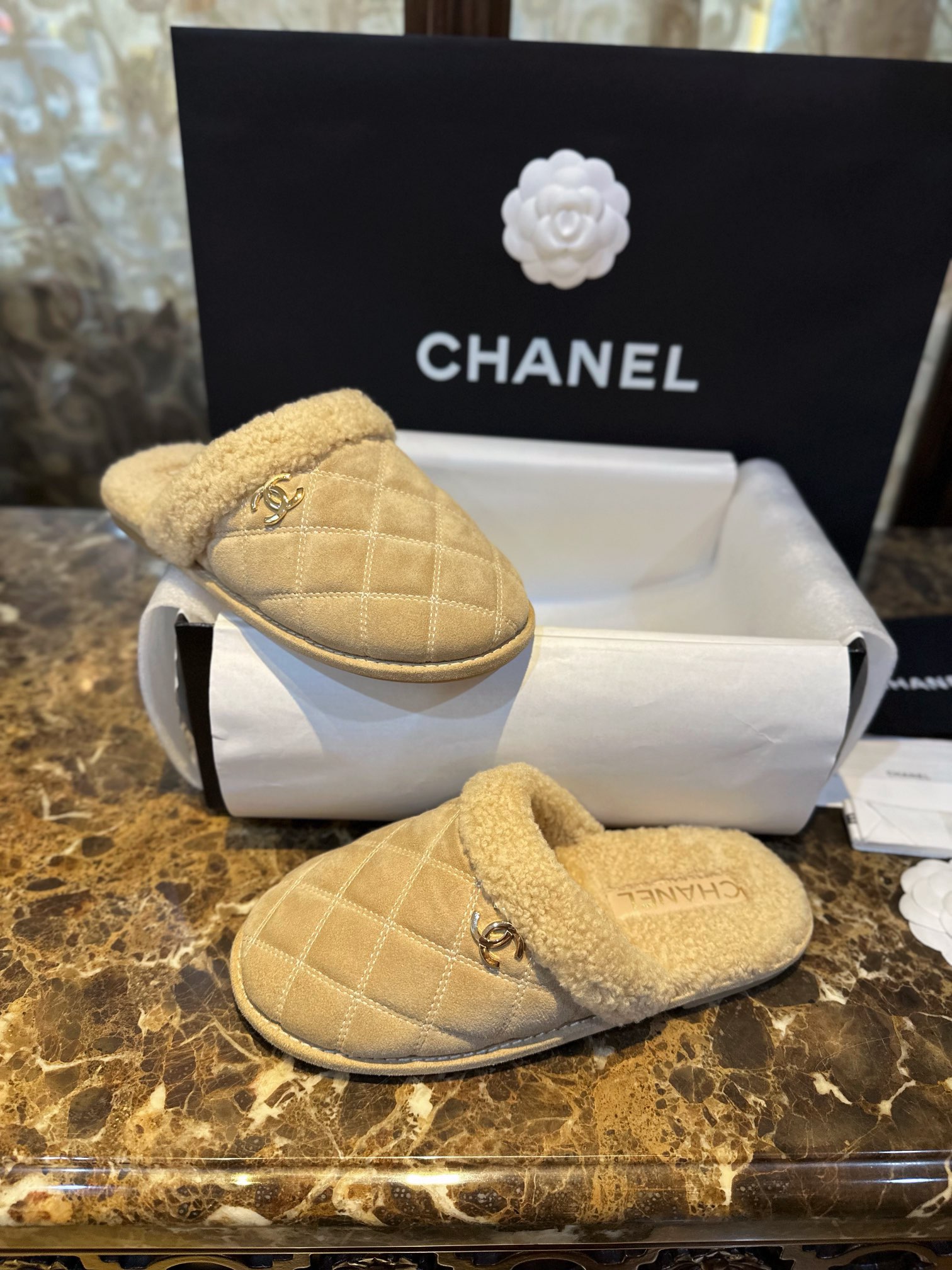 Chanel Shearling Grid Pattern Slide Sandals: Warmth and Style Combined with Luxurious Sheepskin and Cozy Shearling