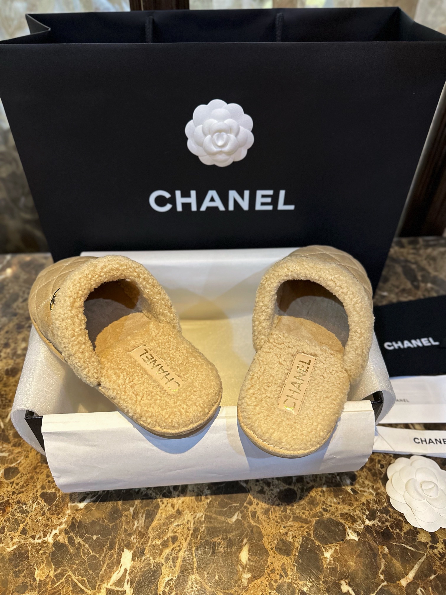 Chanel Shearling Grid Pattern Slide Sandals: Warmth and Style Combined with Luxurious Sheepskin and Cozy Shearling