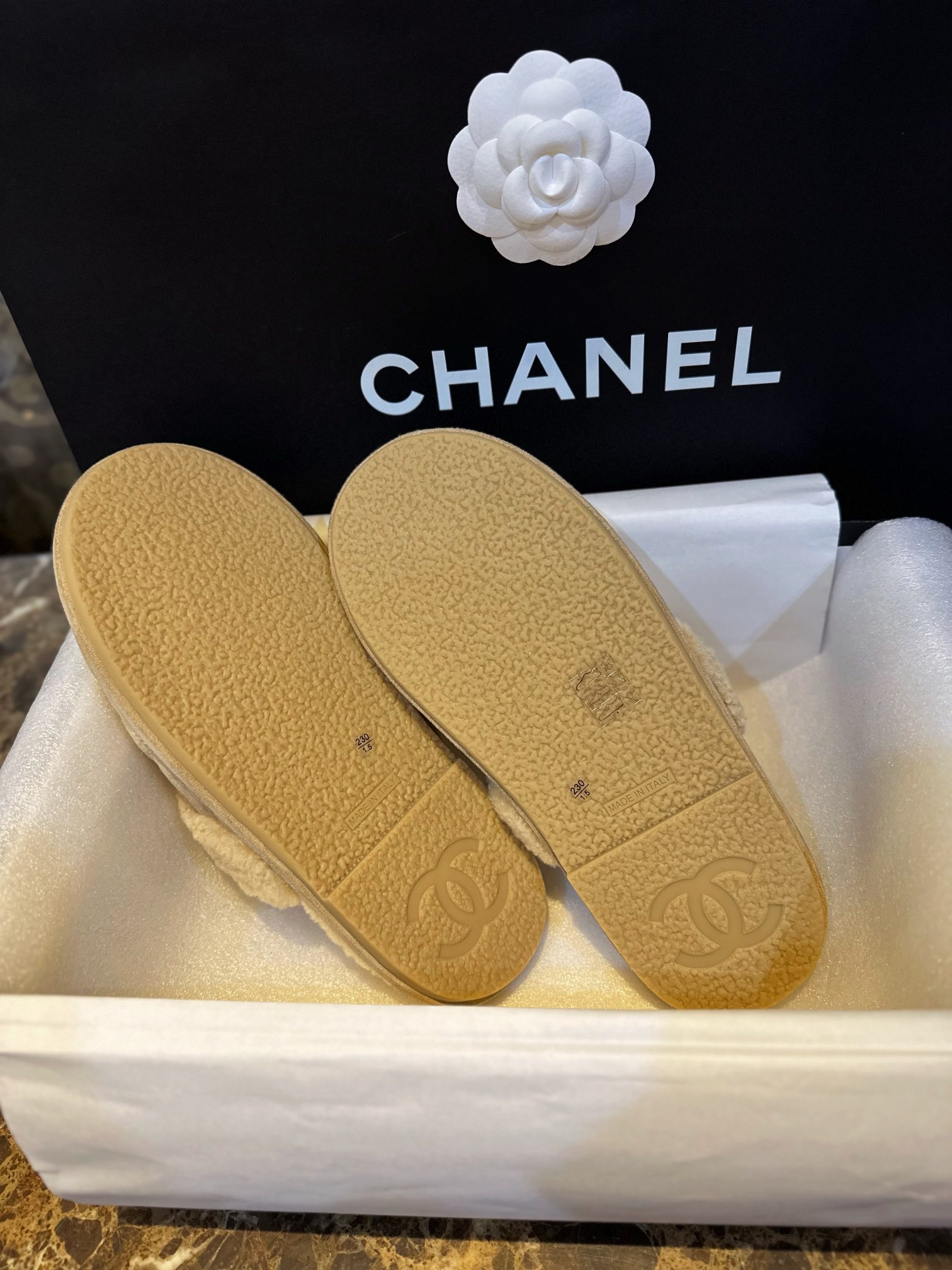 Chanel Shearling Grid Pattern Slide Sandals: Warmth and Style Combined with Luxurious Sheepskin and Cozy Shearling