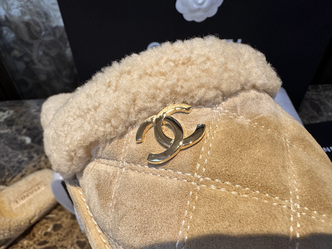 Chanel Shearling Grid Pattern Slide Sandals: Warmth and Style Combined with Luxurious Sheepskin and Cozy Shearling