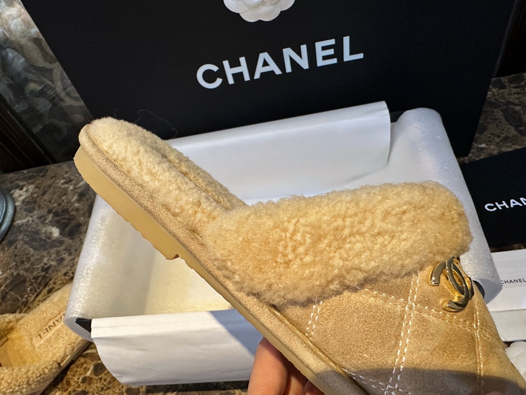 Chanel Shearling Grid Pattern Slide Sandals: Warmth and Style Combined with Luxurious Sheepskin and Cozy Shearling