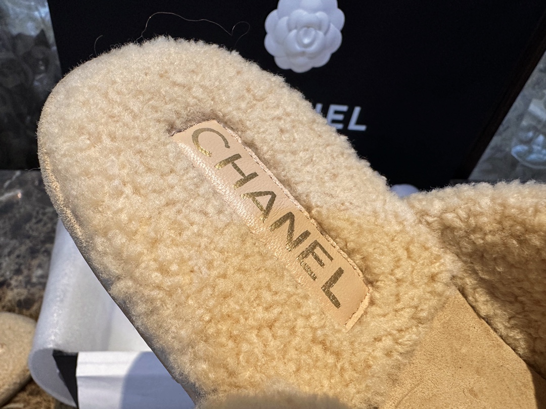 Chanel Shearling Grid Pattern Slide Sandals: Warmth and Style Combined with Luxurious Sheepskin and Cozy Shearling