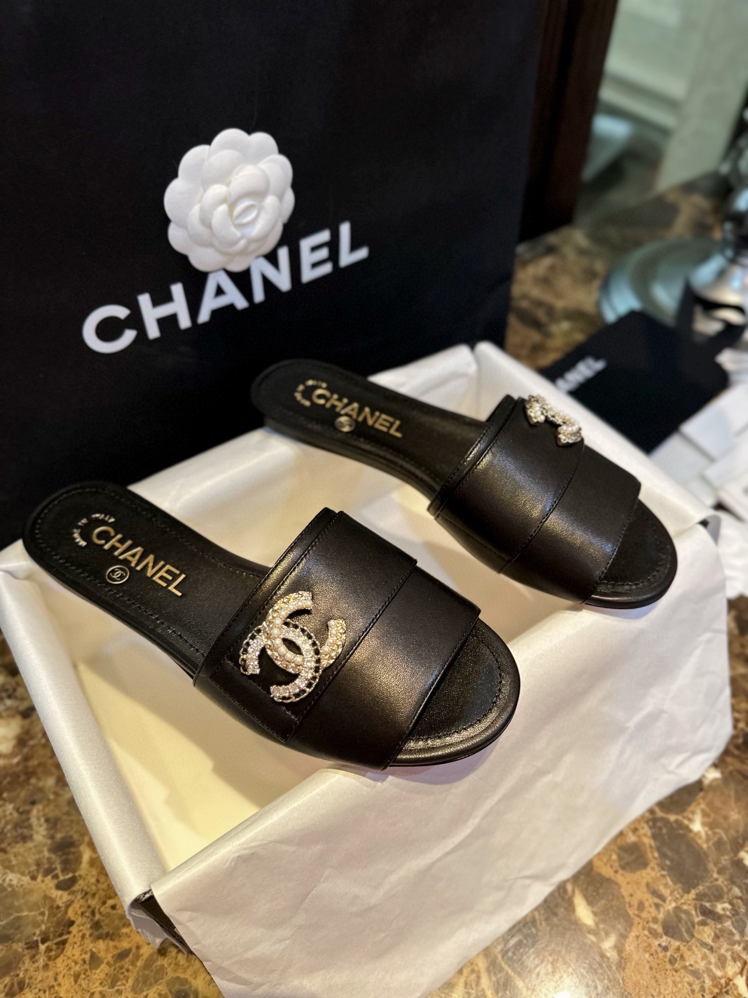 Chanel Apricot and Black Pearl Rhinestone Buckle Slides