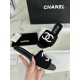 Chanel Black Double C Embroidered Slides: Featuring a Striking Black and White Color Block Design on the Upper, Karen Satin Fabric with Imported Thread Embroidery, Finished with a White Leather Sole. 