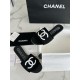 Chanel Black Double C Embroidered Slides: Featuring a Striking Black and White Color Block Design on the Upper, Karen Satin Fabric with Imported Thread Embroidery, Finished with a White Leather Sole. 