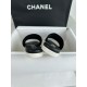 Chanel Black Double C Embroidered Slides: Featuring a Striking Black and White Color Block Design on the Upper, Karen Satin Fabric with Imported Thread Embroidery, Finished with a White Leather Sole. 